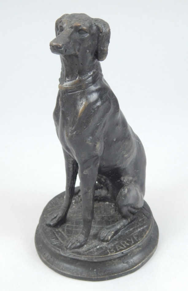 Appraisal: A reproduction bronze figure in the form of a seated