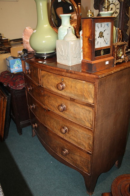 Appraisal: A VICTORIAN MAHOGANY BOW FRONT CHEST of two short and