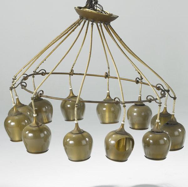 Appraisal: LIGHTOLIER Chandelier with twelve glass-overlayed bronzed metal shades x dia