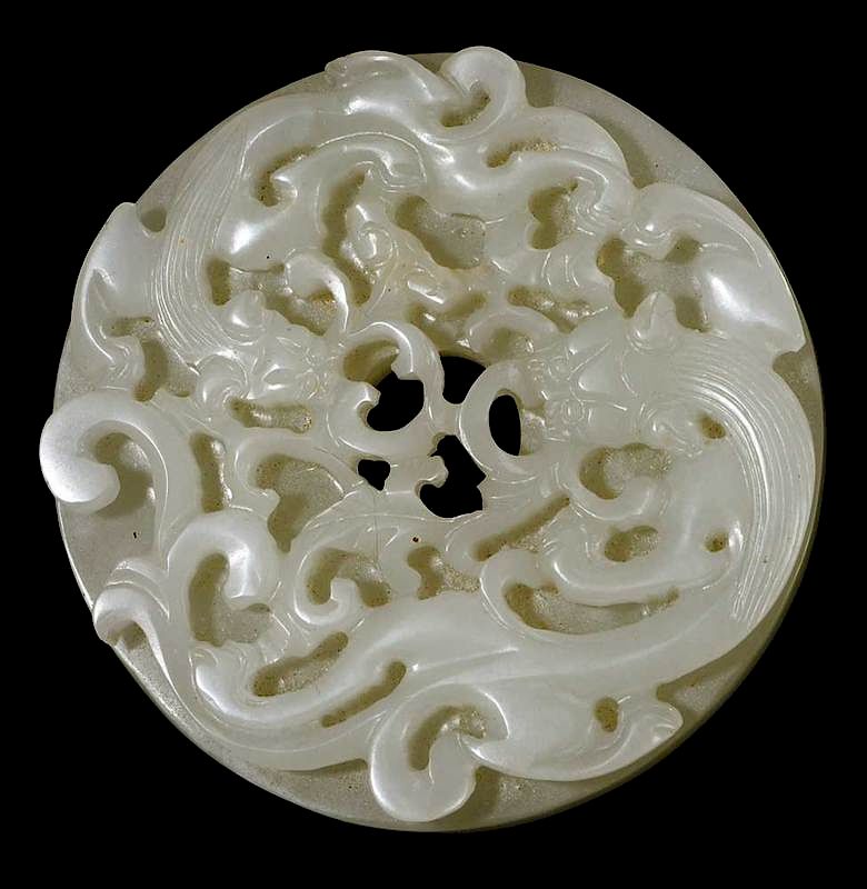 Appraisal: White Jade Bi Disc with Two Dragons Chinese white jade