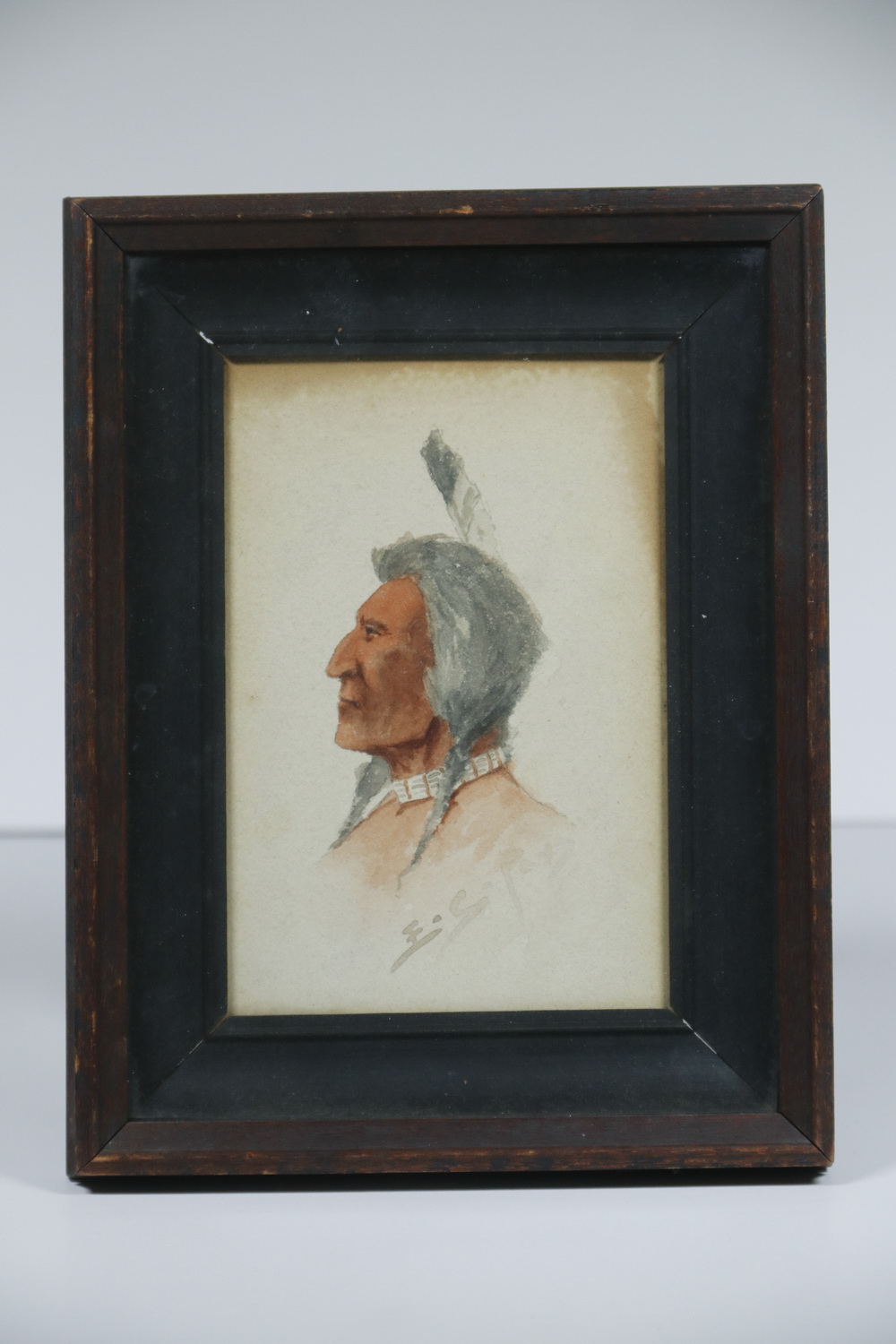 Appraisal: WATERCOLOR PORTRAIT OF NATIVE AMERICAN BRAVE Watercolor painting in a