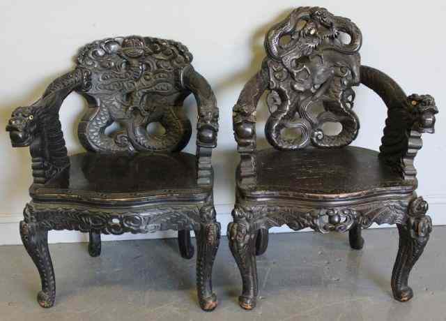 Appraisal: Two Highly Carved Asian Ebonized Chairs From a Pelham NY