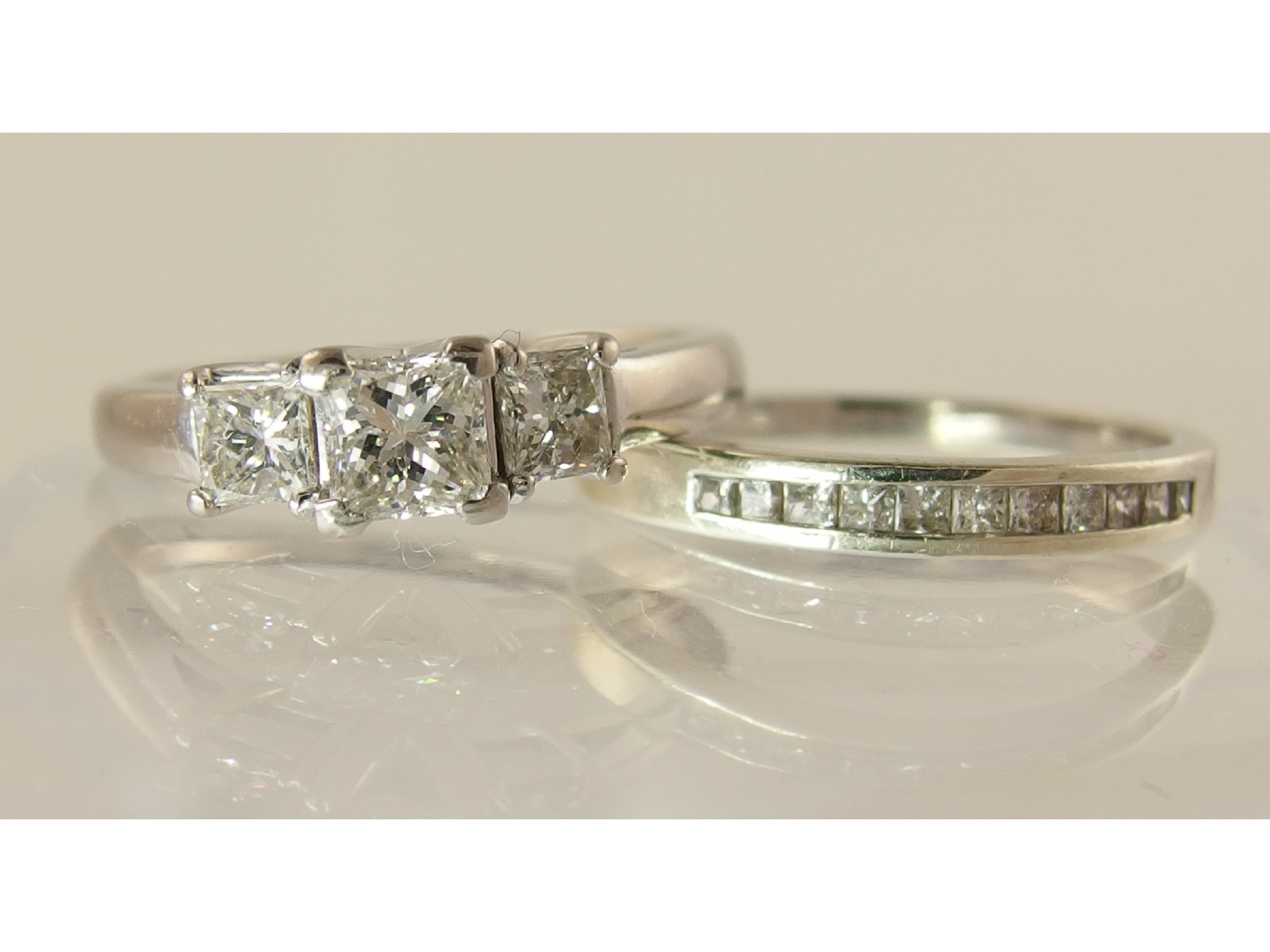 Appraisal: An ct white gold three princess cut diamonds ringof approximately