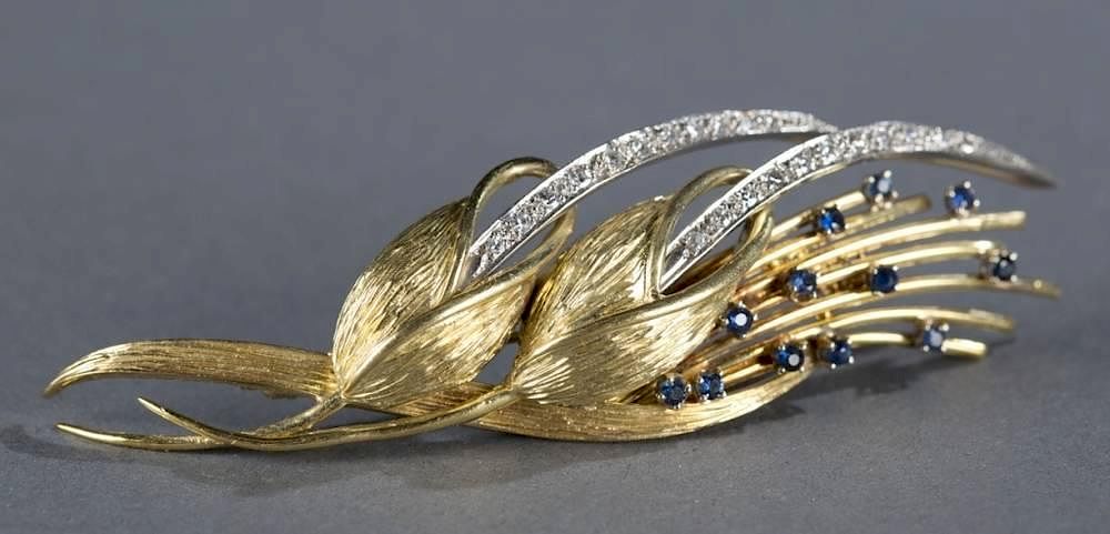 Appraisal: Mid Century diamond and sapphire floral brooch A Lily of