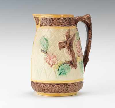 Appraisal: A Majolica Flower and Bird Pitcher Pretty molded milk pitcher