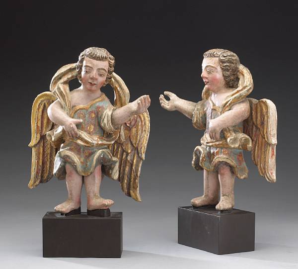 Appraisal: A pair of Portuguese polychrome and parcel gilt carved wood