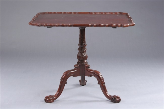 Appraisal: GEORGIAN STYLE MAHOGANY TILT-TOP TRIPOD TABLE th century Rectangular top