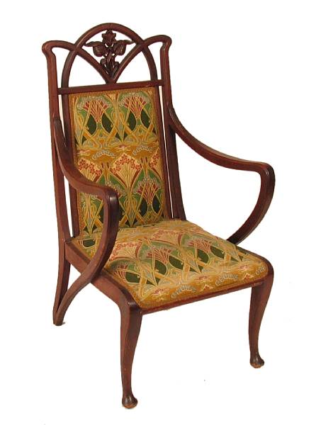 Appraisal: A pair of Art Nouveau open armchairs losses height in