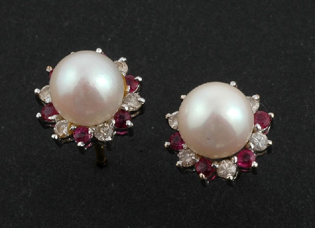 Appraisal: A pair of pearl diamond and ruby earrings The cluster