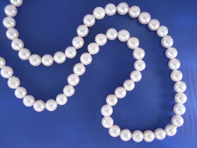 Appraisal: An - mm cultured semi baroque pearl necklace with a