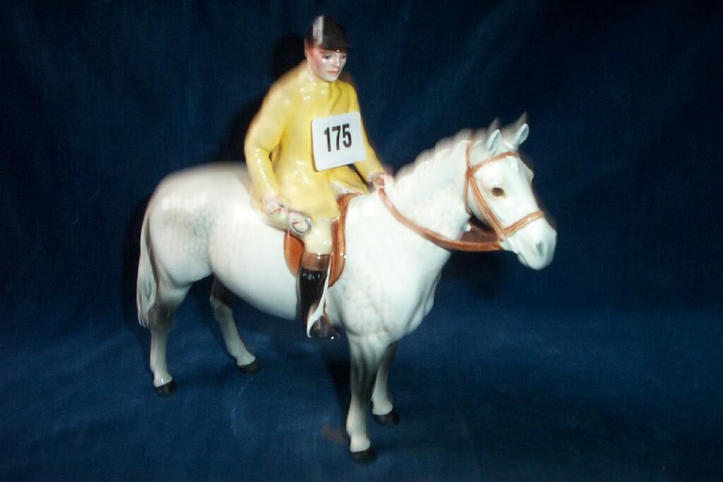 Appraisal: A Beswick model of a huntsman with yellow over painted