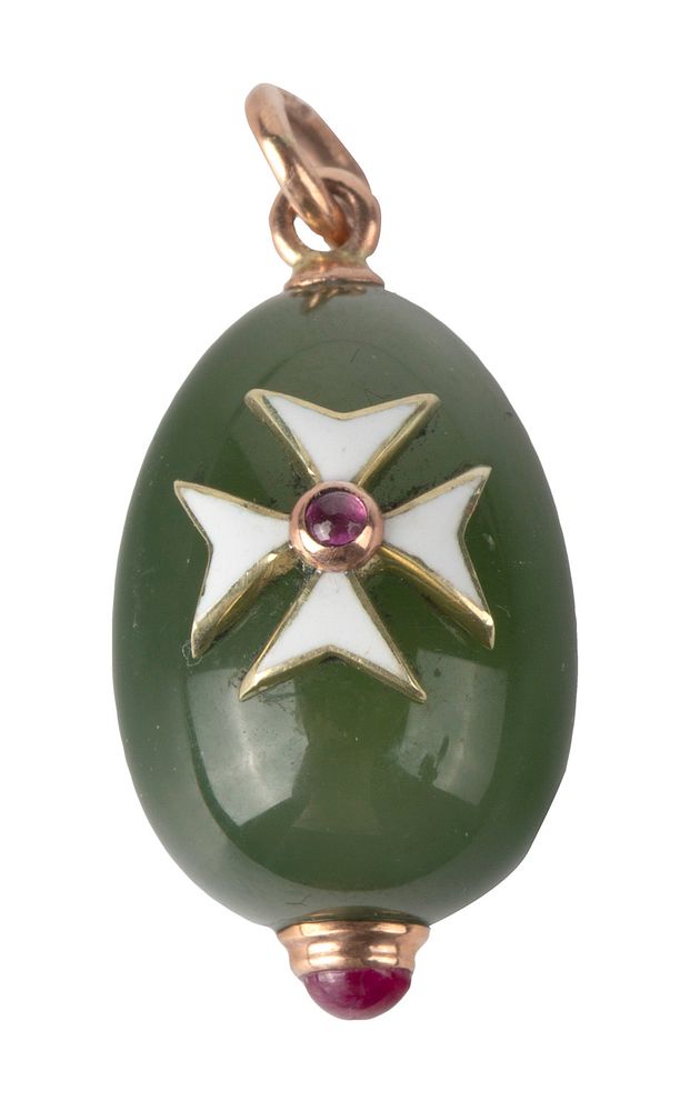 Appraisal: A FABERGE GOLD AND ENAMEL-MOUNTED NEPHRITE EGG PENDANT WORKMASTER MIKHAIL