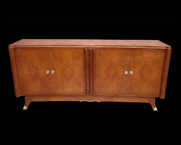 Appraisal: A French Art Deco style amboyna and sycamore credenza circa