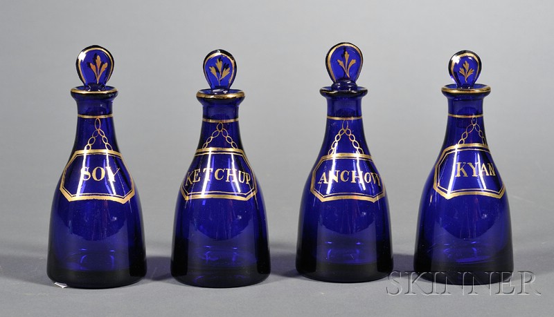 Appraisal: Partial Set of Four Cobalt Blown Glass and Gilt Casters