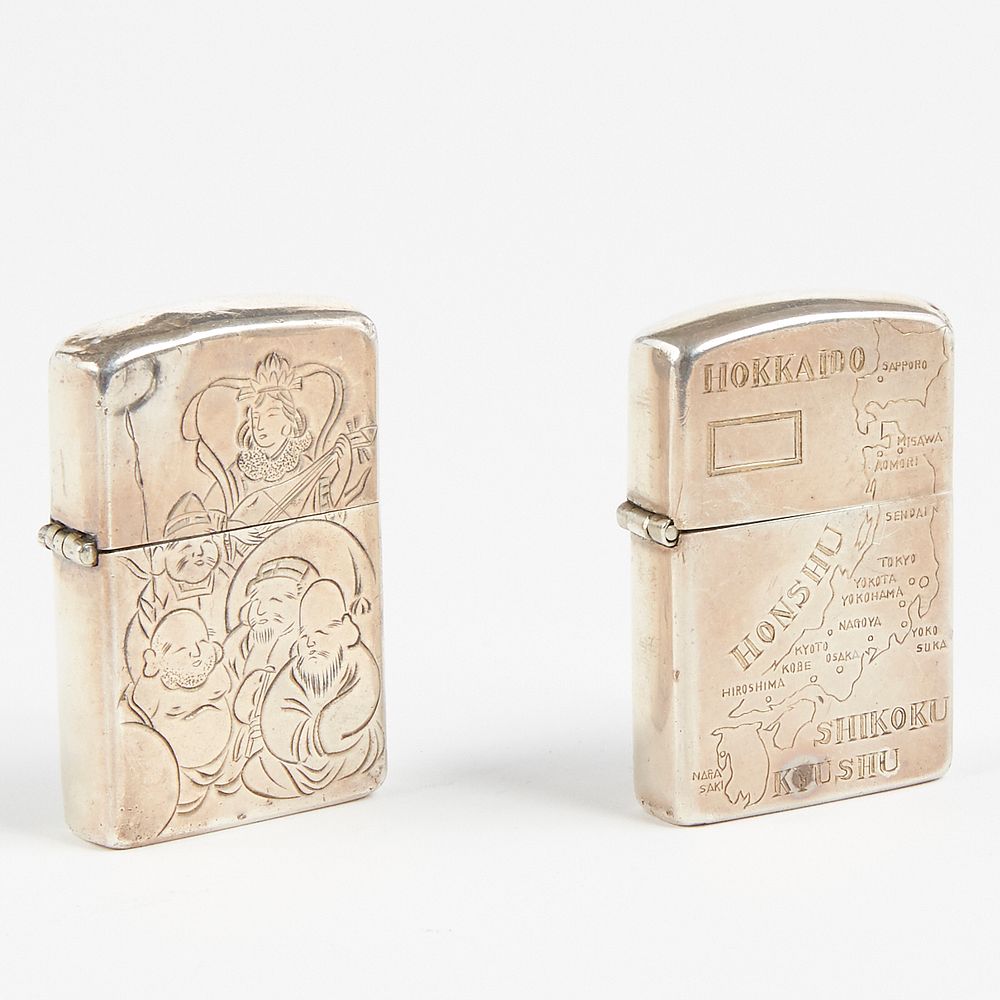 Appraisal: Grp Sterling Silver Zippo Lighters With Japanese Engraving Zippo United