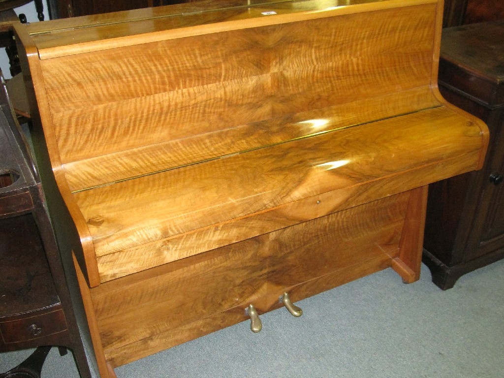 Appraisal: Walnut cased overstrung upright piano by Giles and a piano