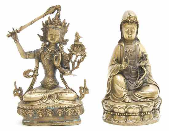 Appraisal: A Chinese Bronze Figure of Guanyin depicted seated on a