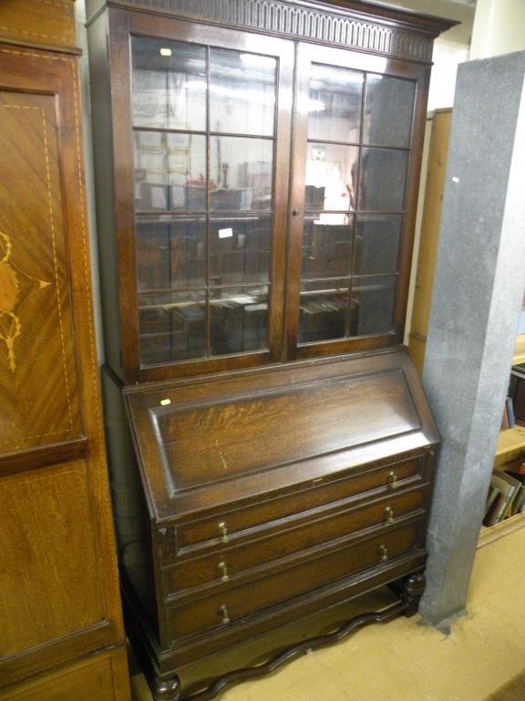 Appraisal: An open bureau bookcase the top with two glazed doors