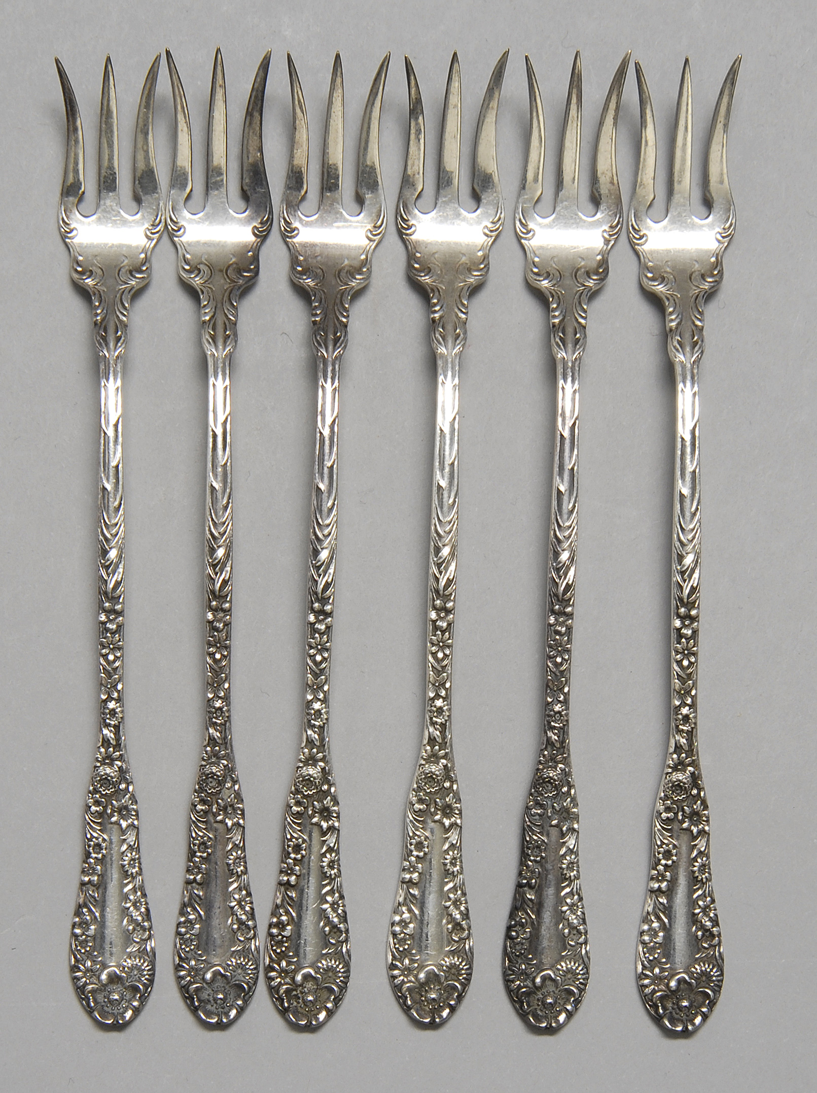 Appraisal: SET OF SIX STERLING SILVER OYSTER FORKS Approx troy oz