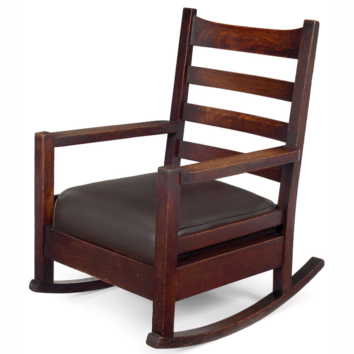 Appraisal: Early Gustav Stickley rocker ladder-back form over a recovered leather