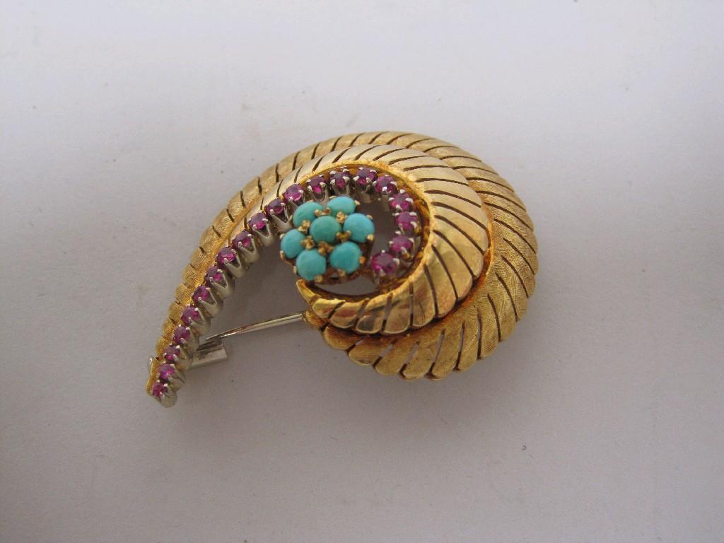 Appraisal: An k gold swirl Brooch set turquoise and rubies