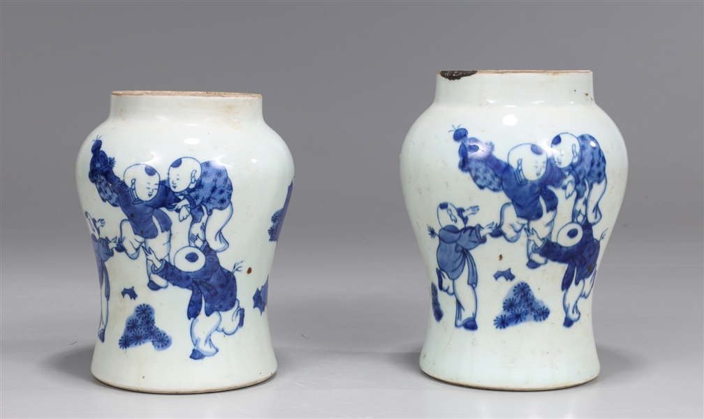 Appraisal: Two Chinese blue and white porcelain jars featuring boys at