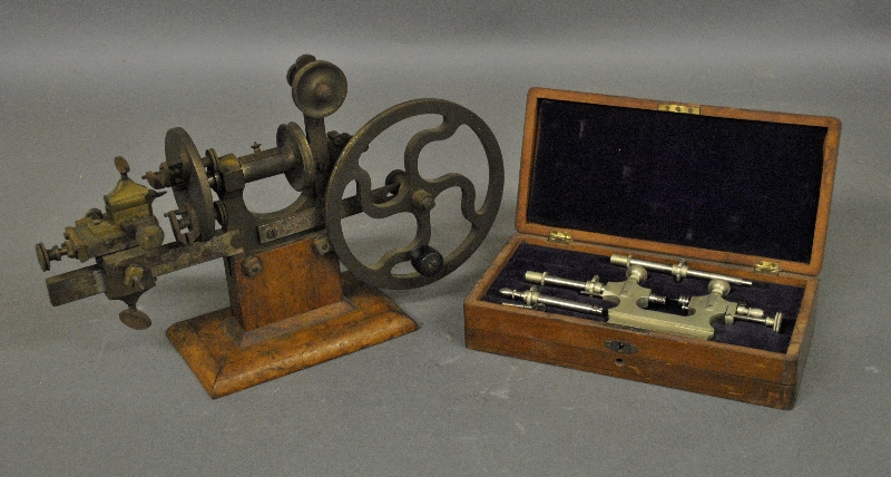 Appraisal: - Brass metal manual lathe with a maple base h