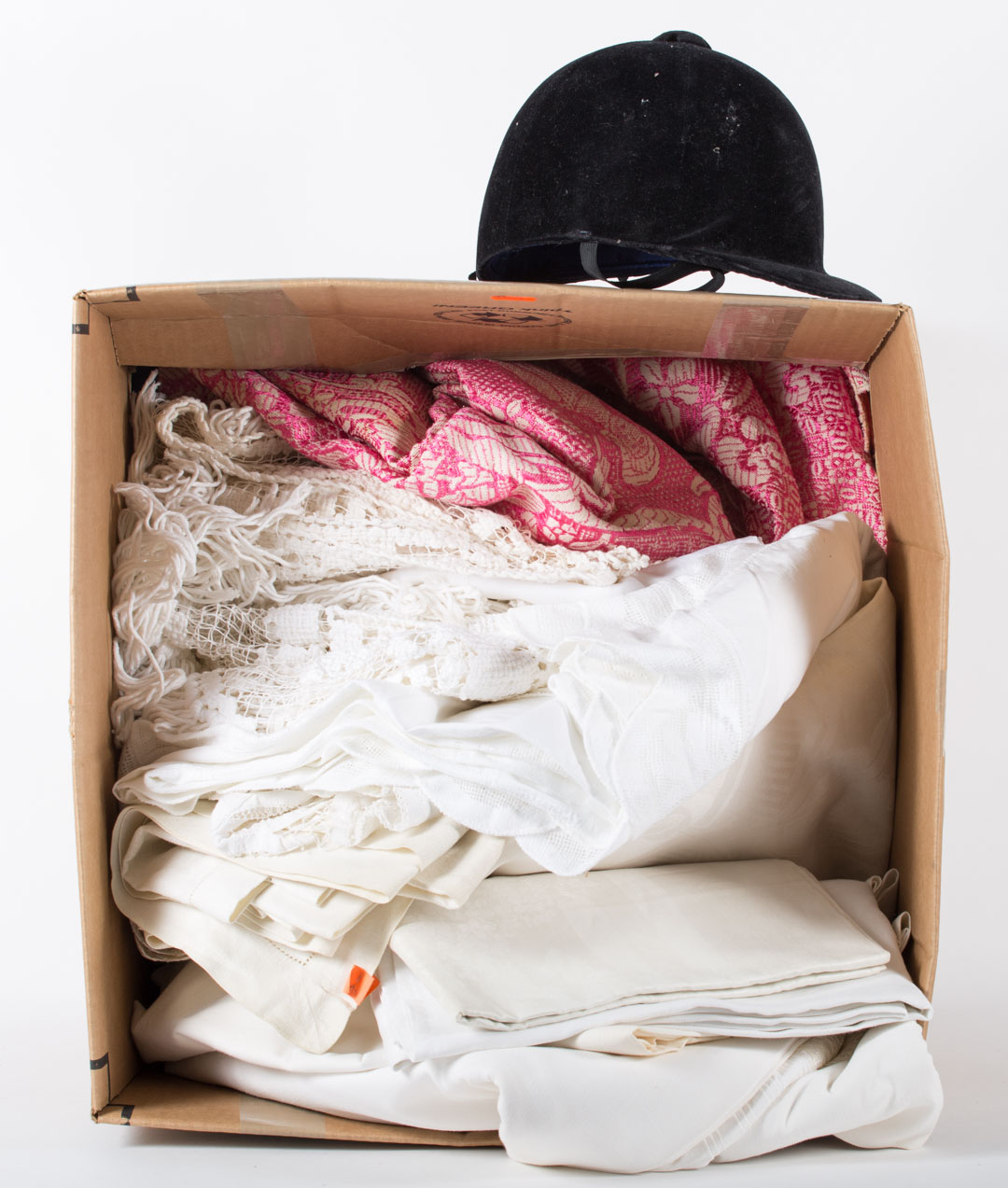 Appraisal: Assortment of linens and a riding hat Undernumber