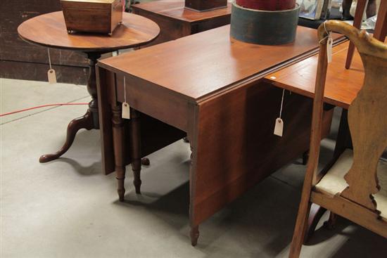 Appraisal: DROP LEAF TABLE Walnut having a single board top rectangular