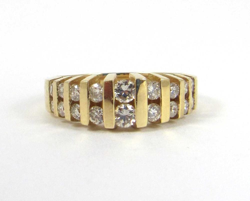 Appraisal: DIAMOND AND FOURTEEN KARAT GOLD RING tension set with nine