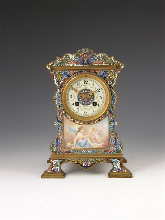 Appraisal: A French brass and champleve enamel mantel clock