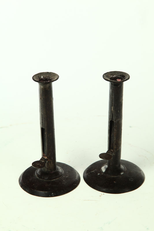 Appraisal: PAIR OF HOGSCRAPER CANDLESTICKS American or English th century Push