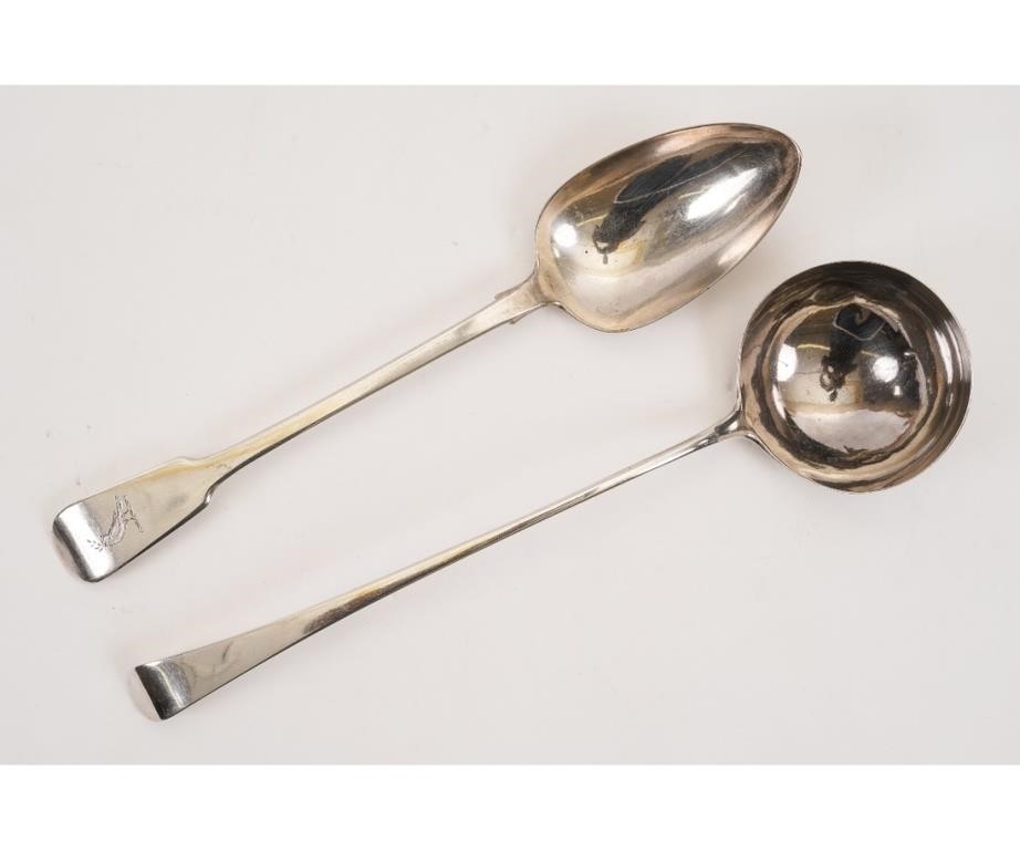 Appraisal: Large Georgian silver stuffing spoon with armorial crest possibly by