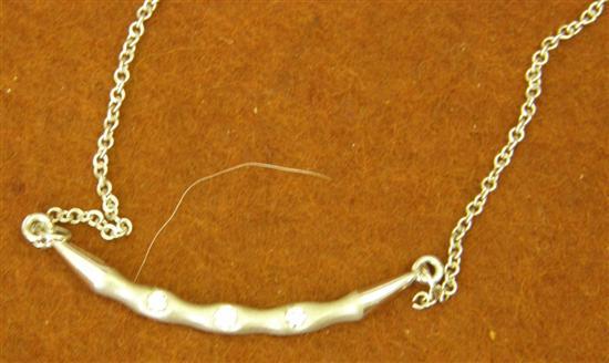 Appraisal: Diamond set textured crescent style necklace in hallmarked ct white