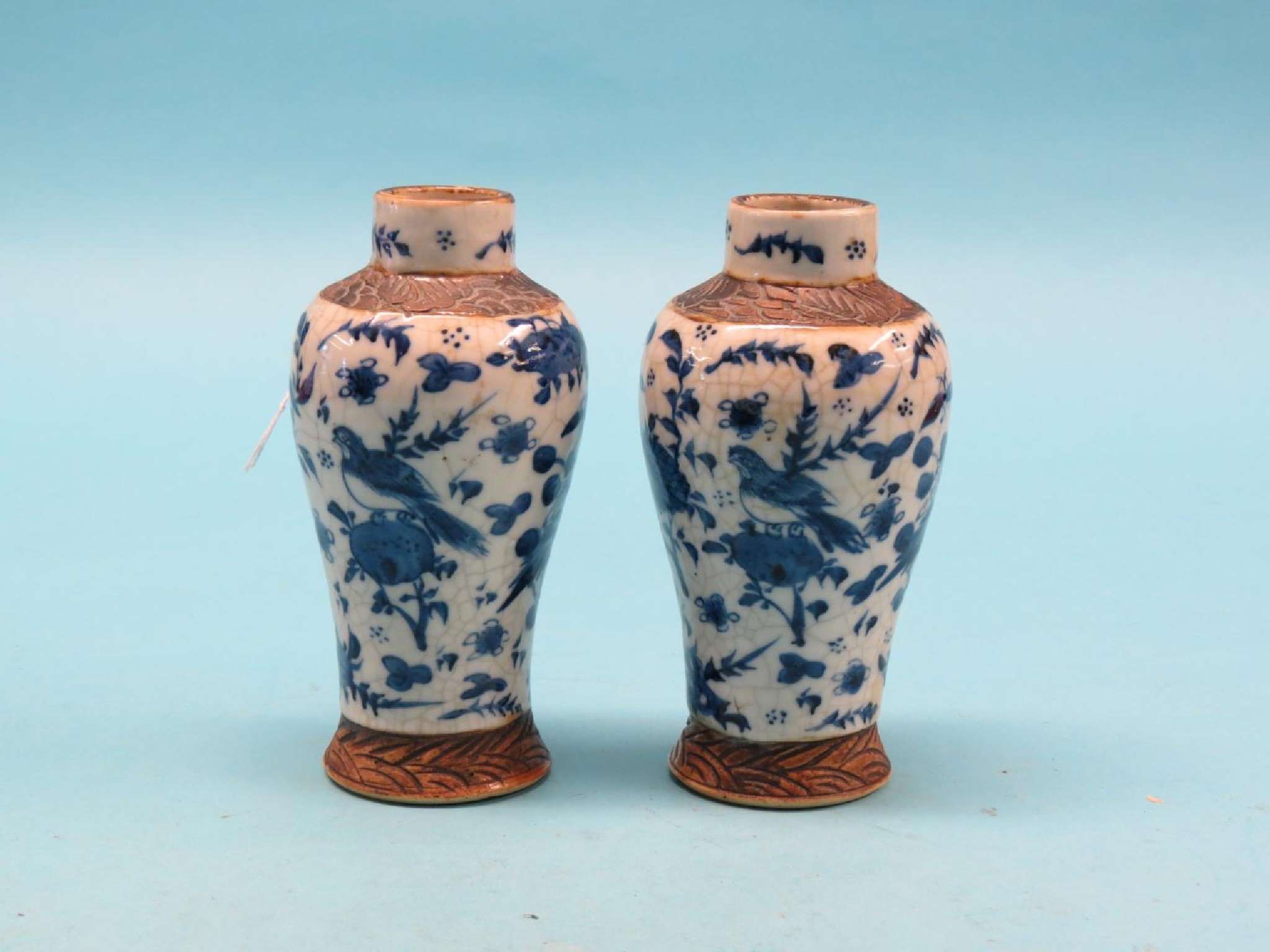 Appraisal: A pair of Chinese porcelain jars baluster-shape painted with birds