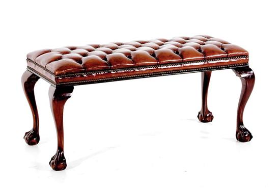 Appraisal: Georgian style carved mahogany bench tufted upholstered bench seat on