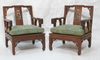 Appraisal: Pr Asian style Carved Oak Lounge Chairs Center s Pr