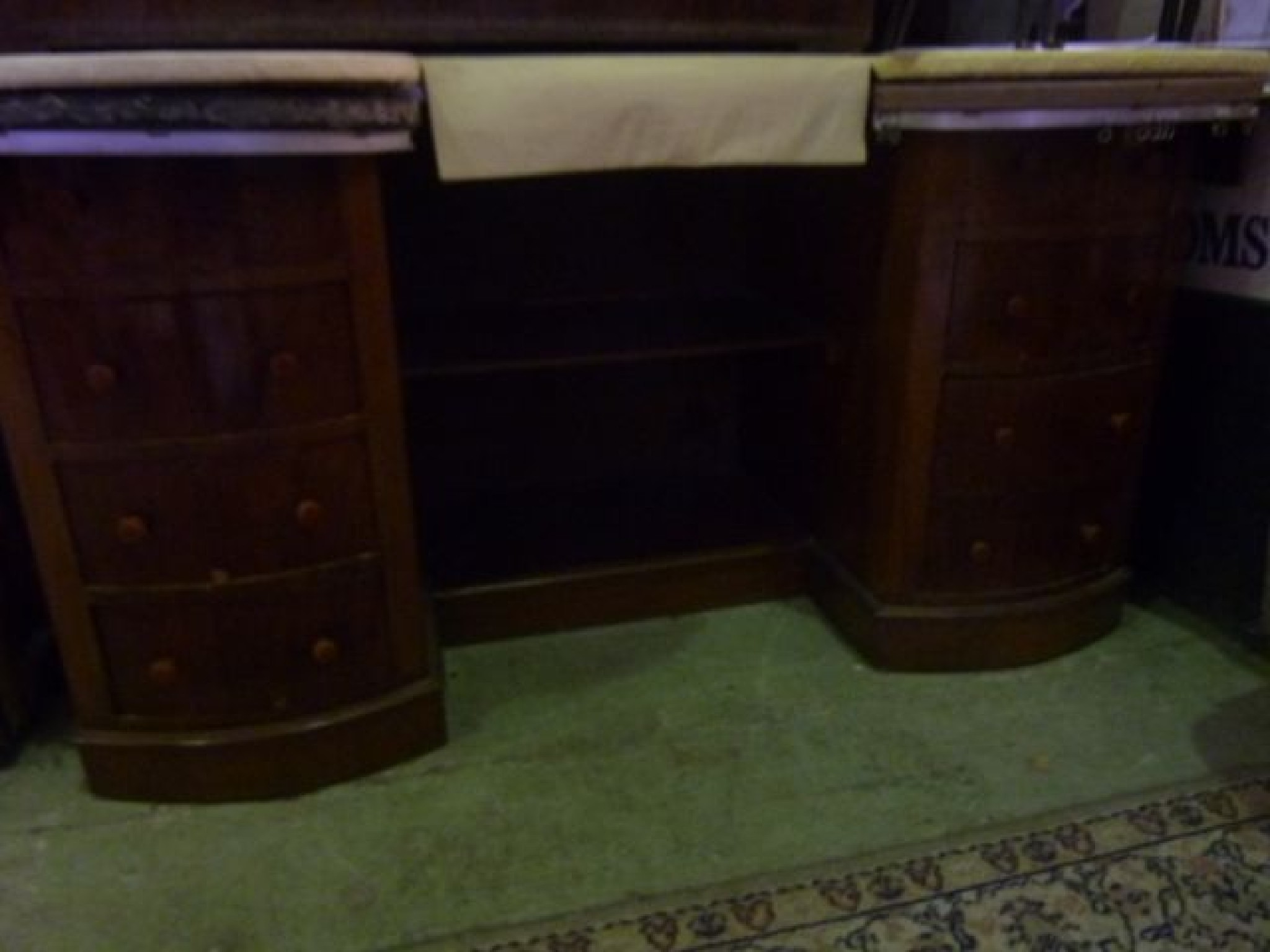 Appraisal: A Victorian walnut twin pedestal bow fronted inverted breakfront dressing