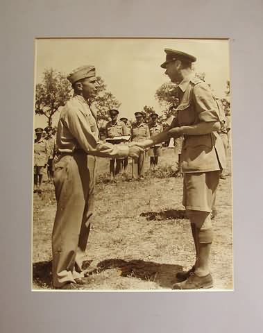 Appraisal: Large format photograph measuring x showing Gen Lemnitzer receiving the