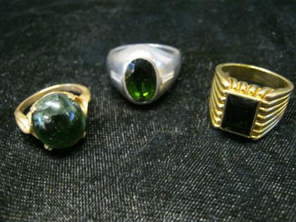 Appraisal: Group of three green tourmaline ringsOf varying size and form