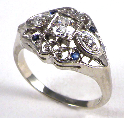 Appraisal: DIAMOND SAPPHIRE AND WHITE GOLD RING The k pierced white