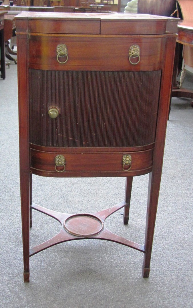 Appraisal: A George III mahogany lift top night stand with tambour