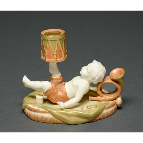 Appraisal: A Royal Worcester boy and drum hand candlestick decorated in