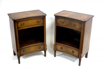 Appraisal: A pair of reproduction bedside tables with concave fronts cm