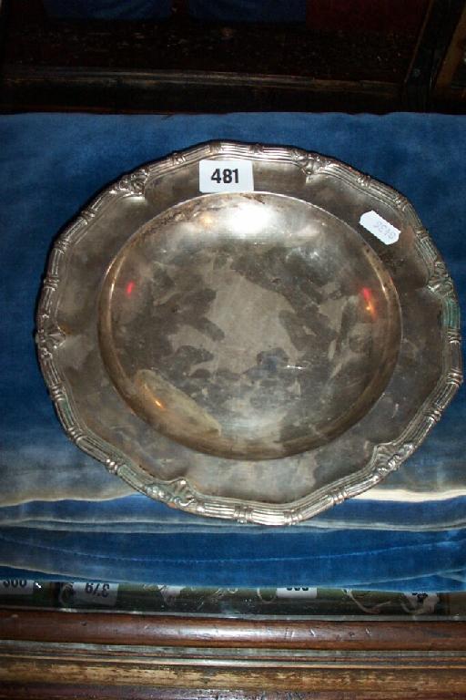 Appraisal: An open silver dish with relief border London oz makers