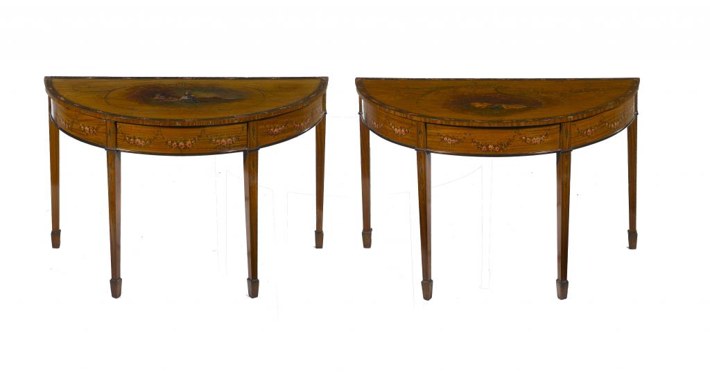 Appraisal: TWO EDWARD VII PAINTED SATINWOOD SEMI-CIRCULAR TABLES the crossbanded top