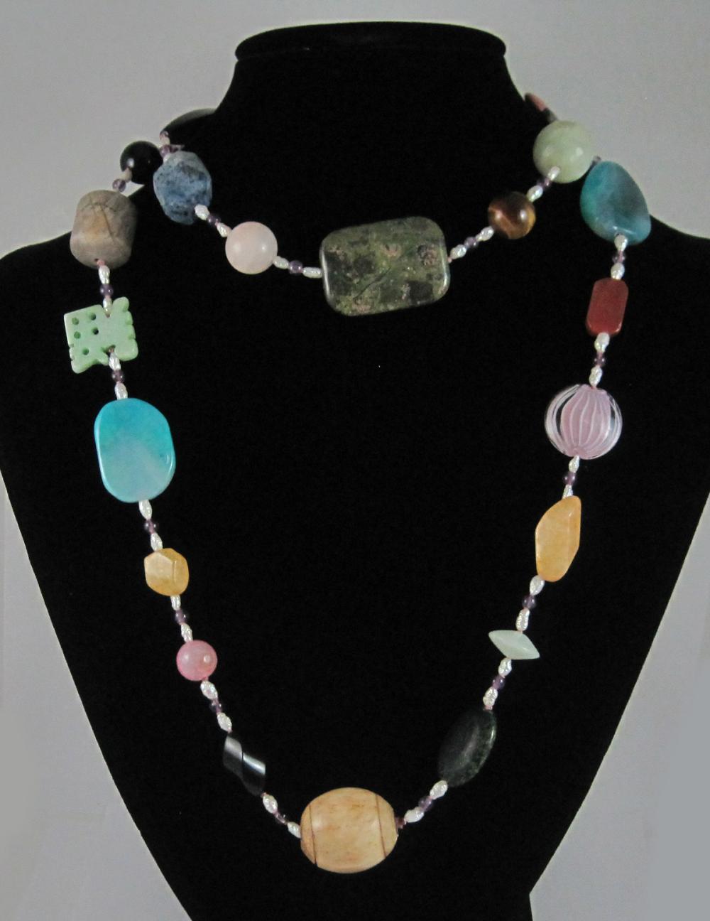 Appraisal: MULTI COLOR GEMSTONE BEAD NECKLACE The rope length necklace measuring