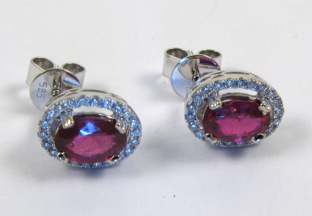 Appraisal: PAIR OF RUBY AND DIAMOND EARRINGS each k white gold