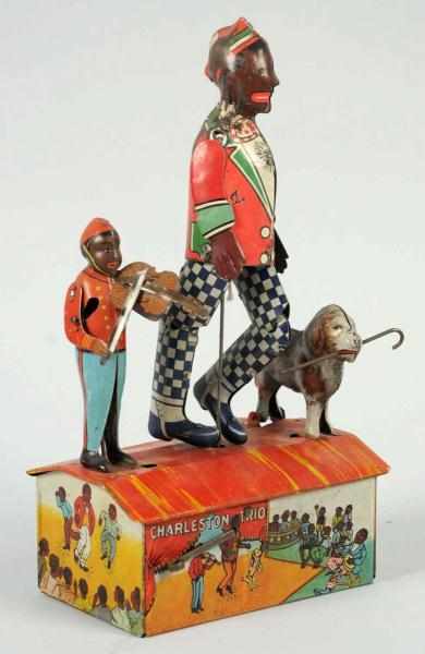 Appraisal: Tin Marx Charleston Trio Dancing Wind-Up Toy Click for full