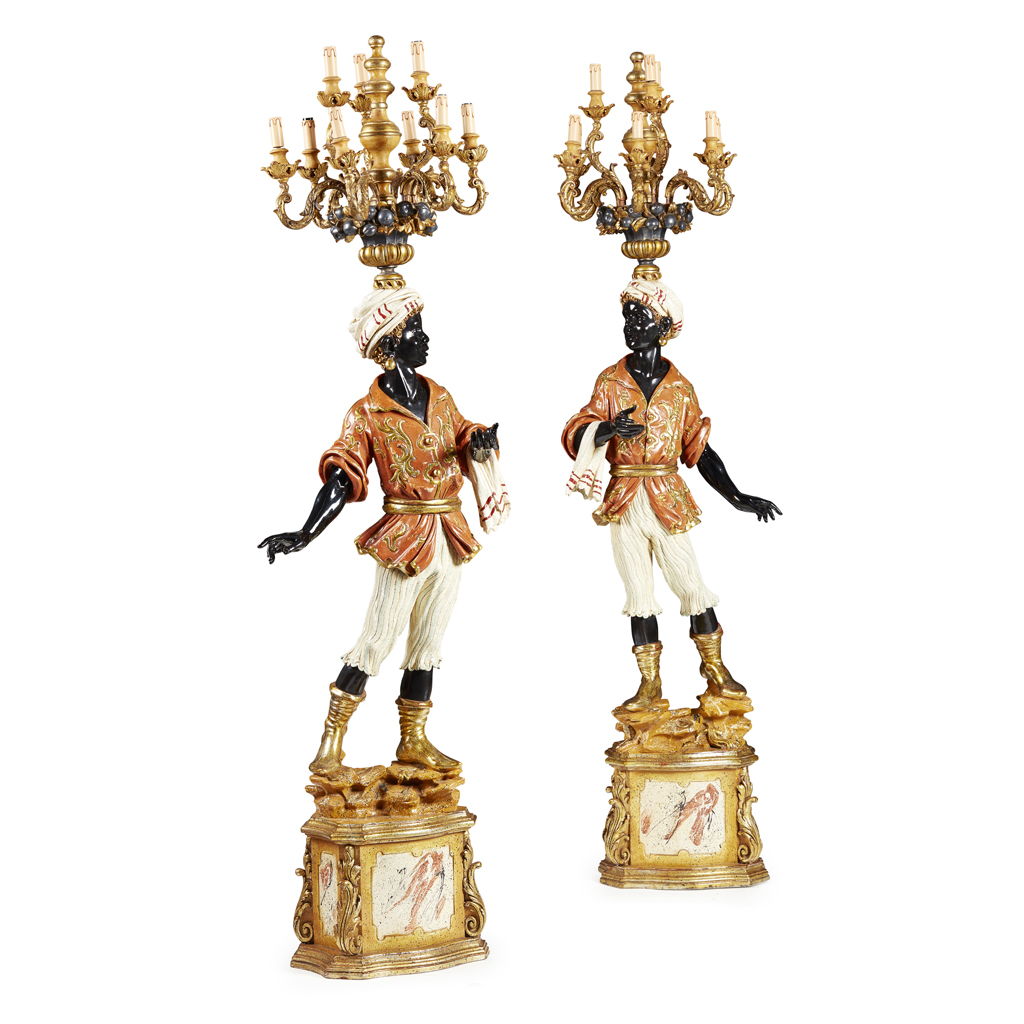 Appraisal: PAIR OF ITALIAN PAINTED AND PARCEL GILT CARVED WOOD BLACKAMOOR